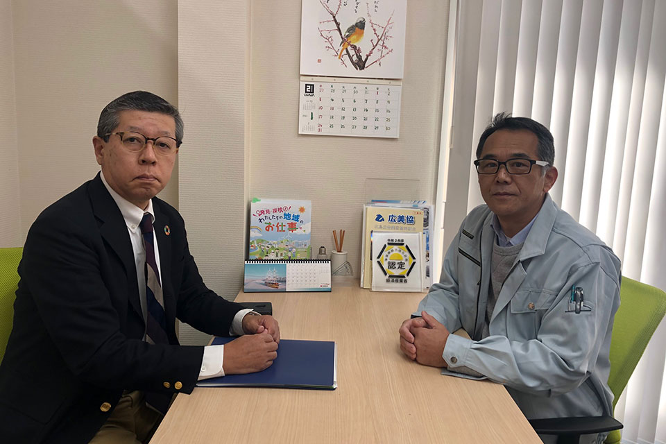 濵田行雄社長と井上明雄氏の写真